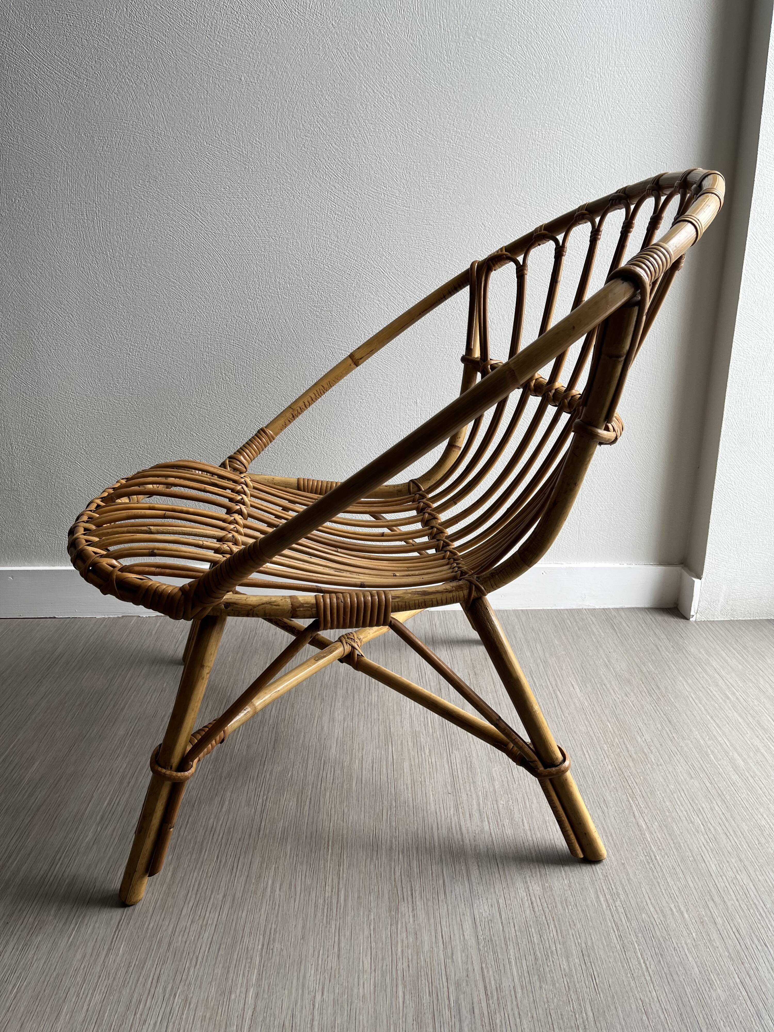 Vintage rattan shell armchairs