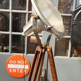 Industrial projector on tripod waxed wood
