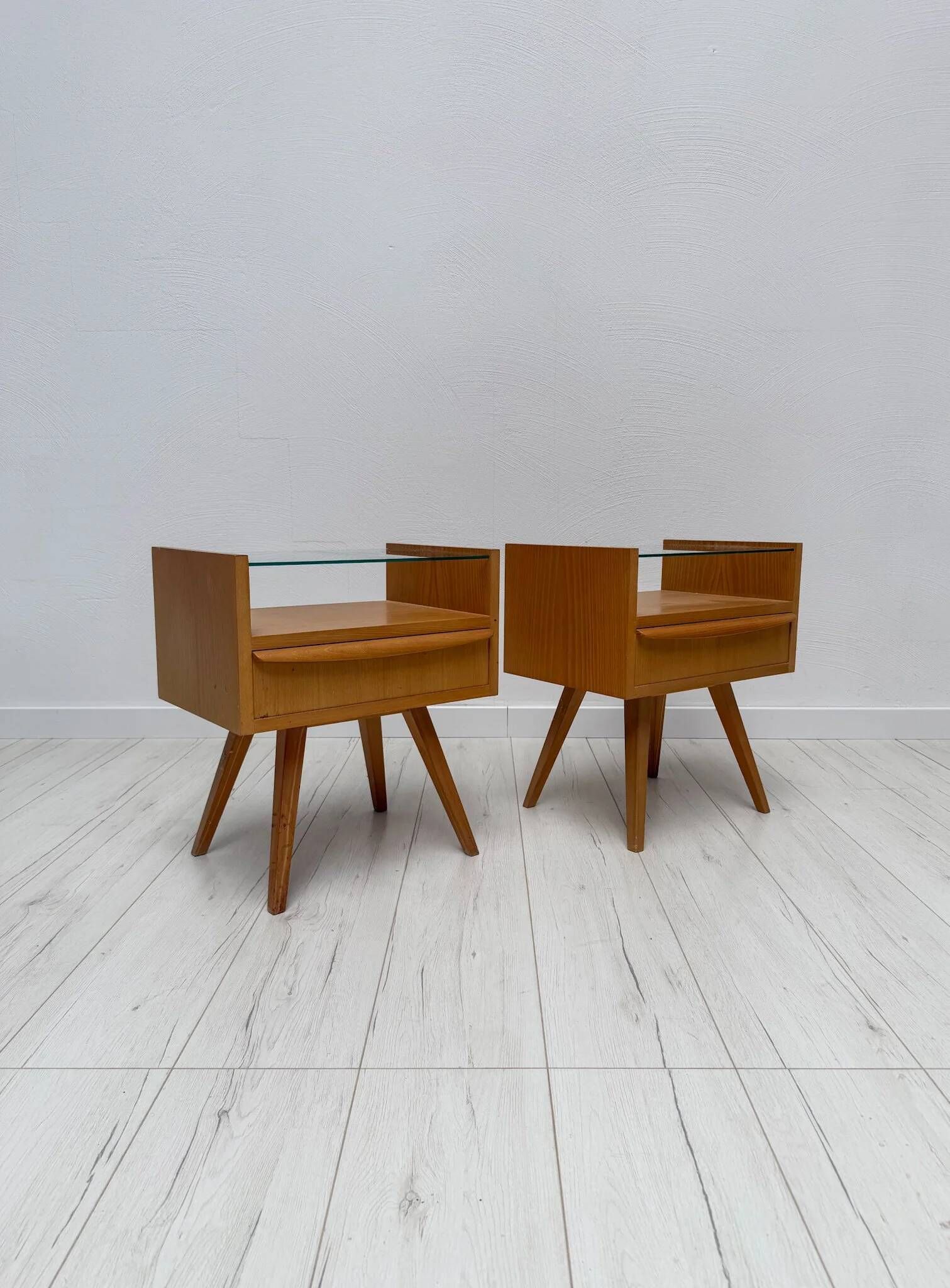 1960s vintage pair of mid-century walnut nightstands with glass shelves