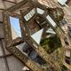 Mirror with parecloses