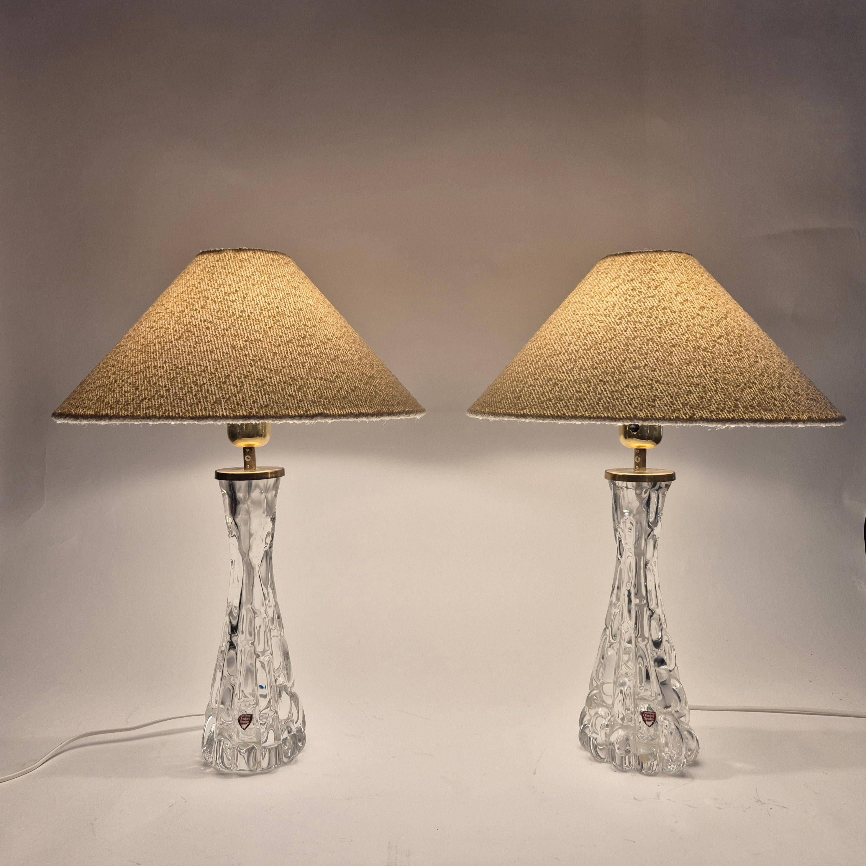 Elegant pair of table lamps The Modern Scandinavian Modern with Orrefors glass and brass.