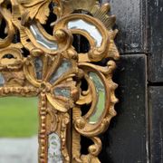 Louis XV style mirror with parecloses in gilded wood, early 19th century, Empire A