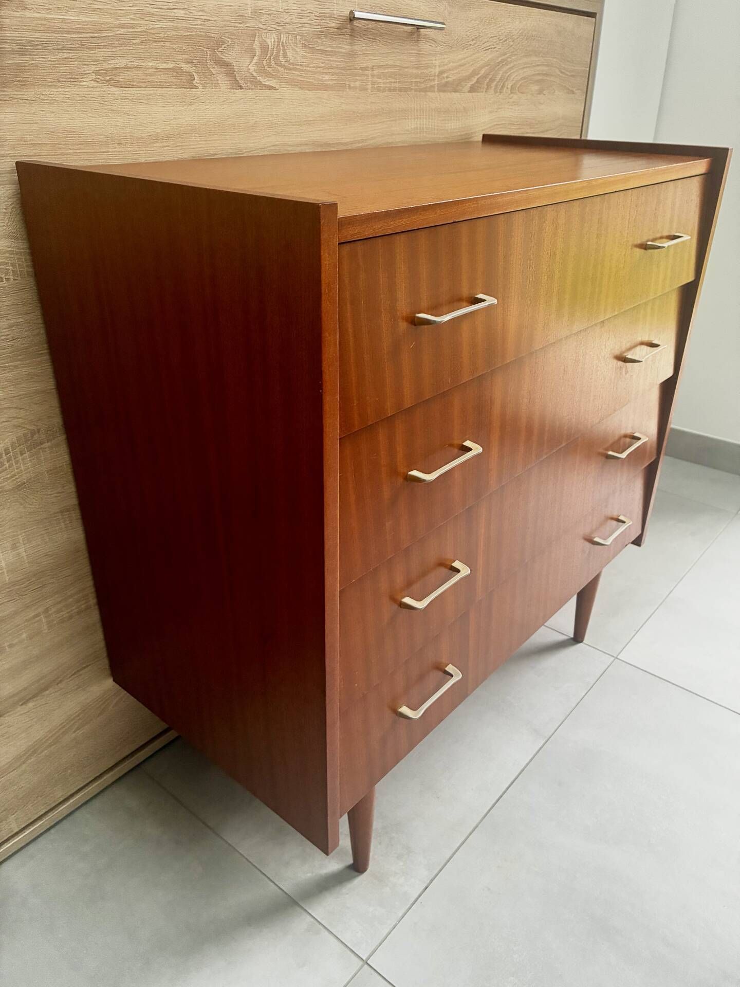 Vintage teak chest of drawers with 4 drawers from the 1960s.