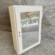 Medicine cupboard with mirror