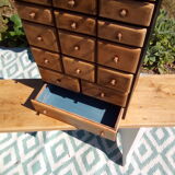 Small furniture with small drawers says layette