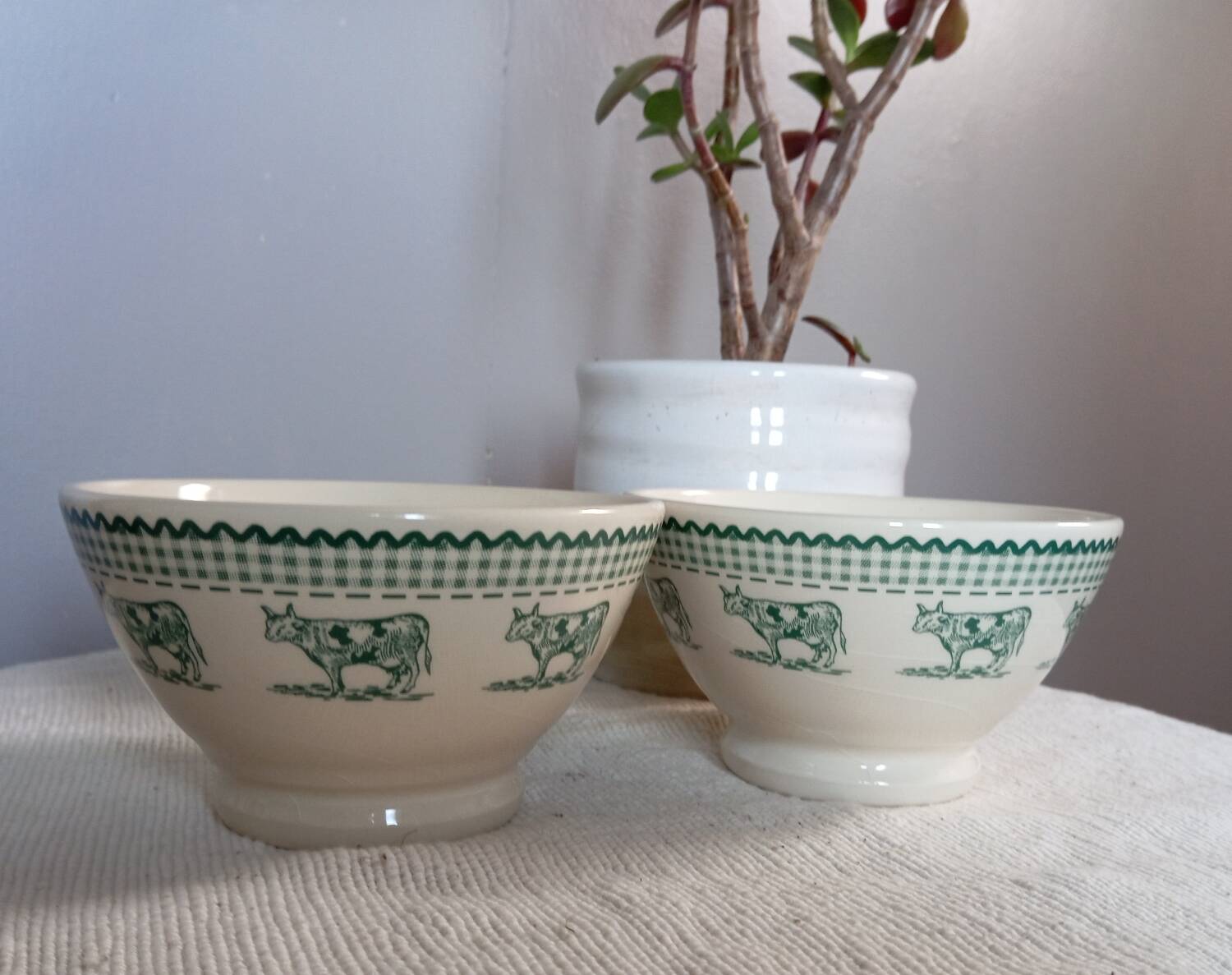 Duo of “daisy” cow decor bowls by Geneviève Lethu, 1996