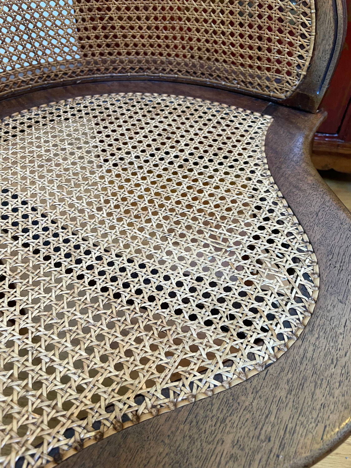 Cane seat armchair from the 19th century in the Louis XV style, known as "couillard".