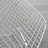 Pair of armchairs in white patinated mesh metal.