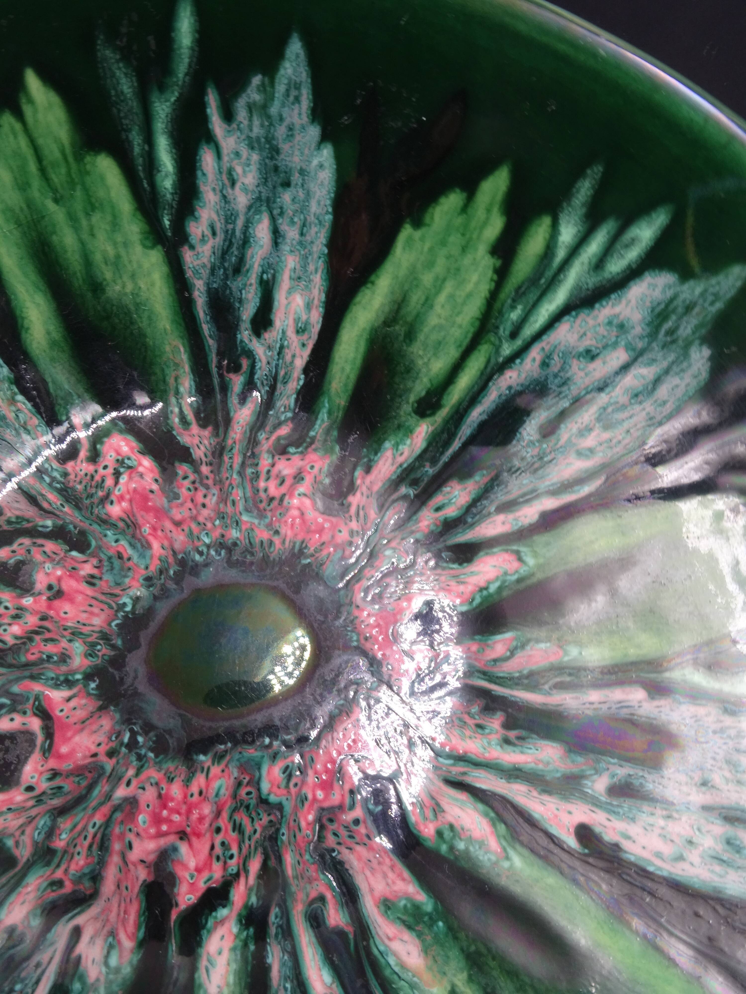 Green faience bowl decorated with multicolored drips around 1970