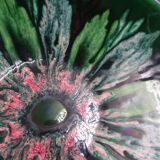 Green faience bowl decorated with multicolored drips around 1970