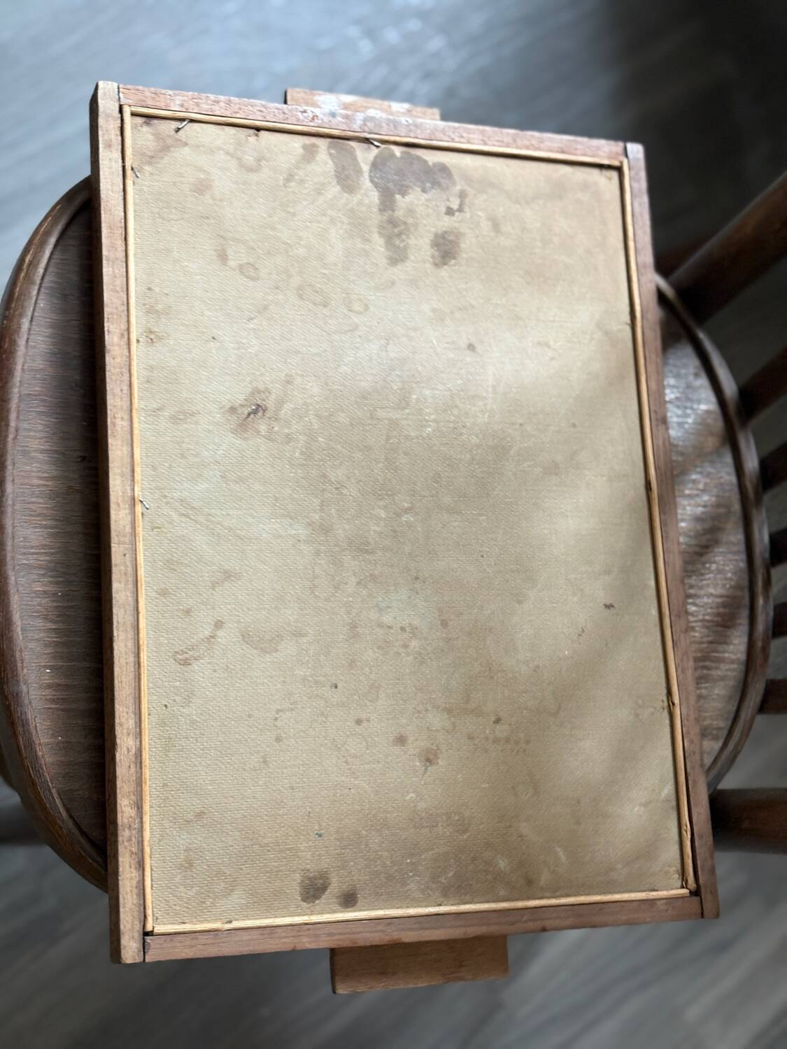 Antique wooden tray depicting a family scene