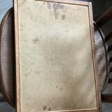 Antique wooden tray depicting a family scene