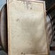 Antique wooden tray depicting a family scene