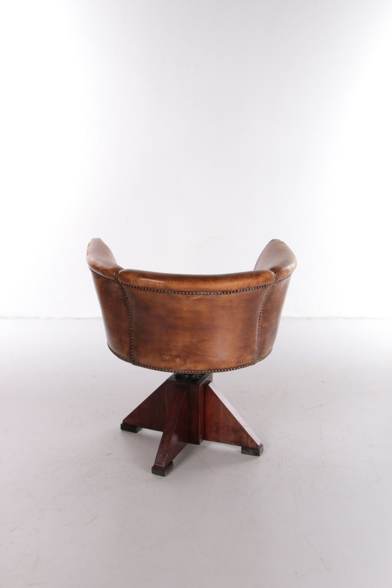 Sheepskin leather desk chair with wooden swivel base, 1970