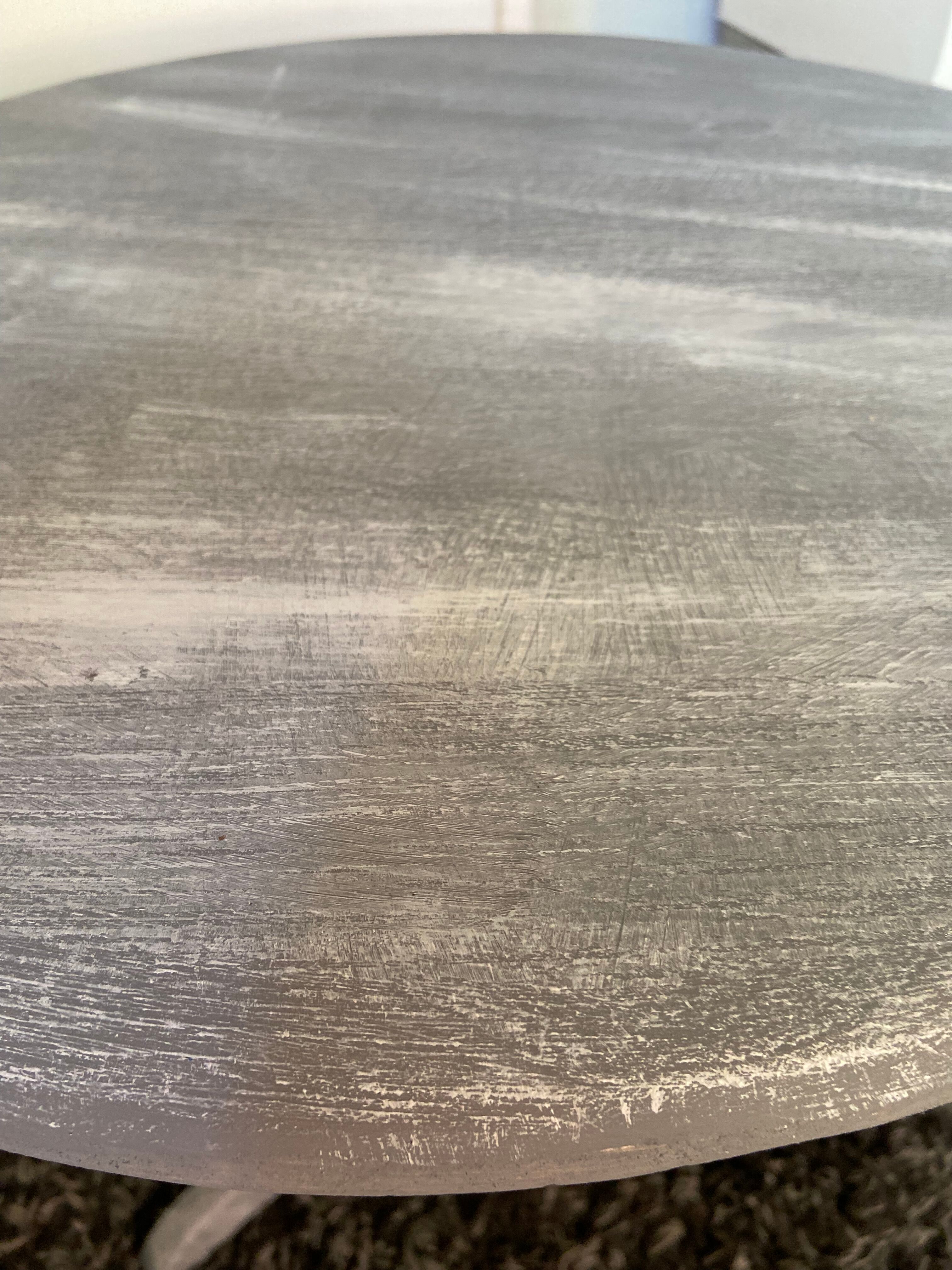 Patinated wooden pedestal table