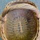 Round oval basket in rattan and woven wicker with handle