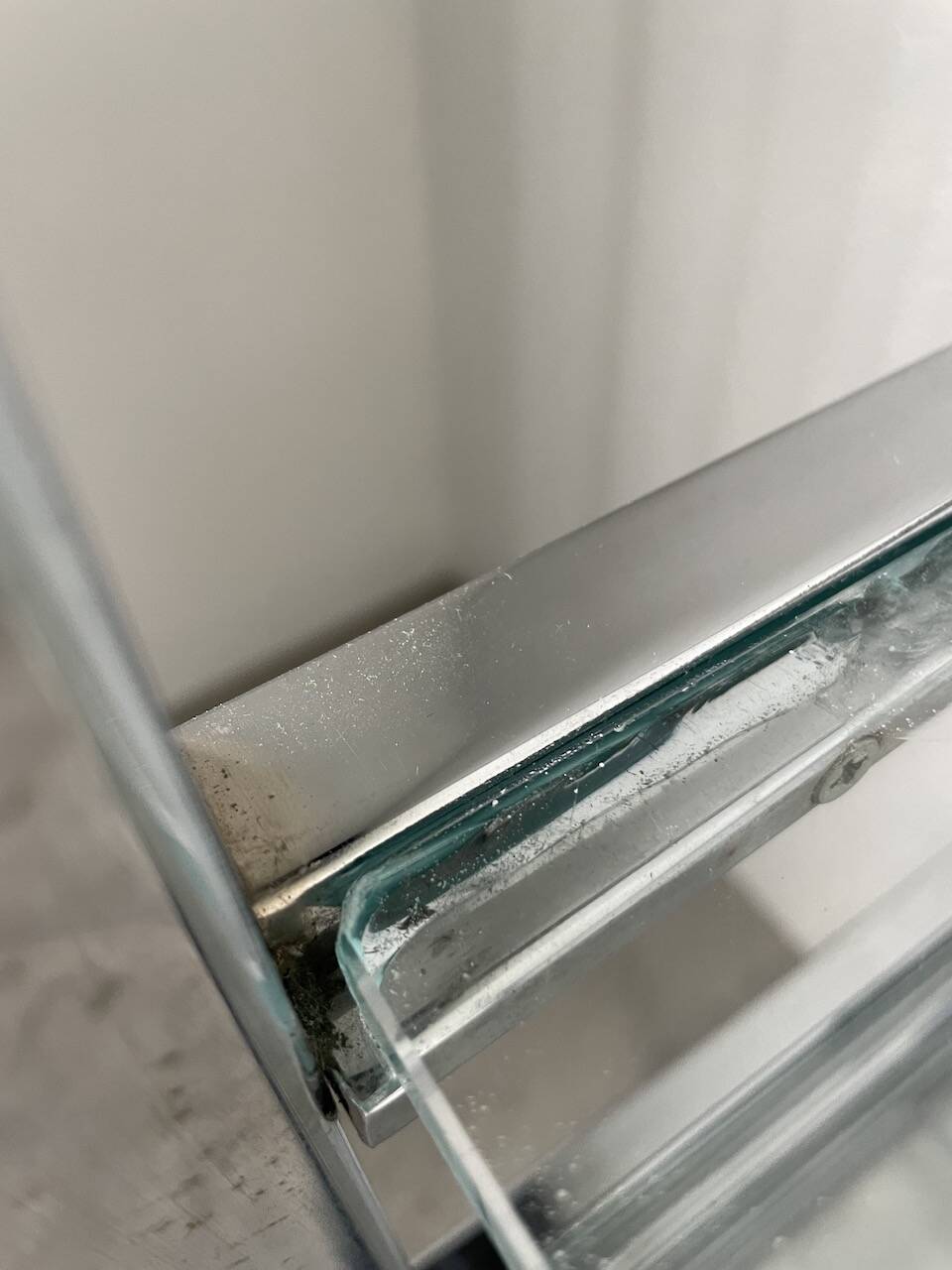 Pair of chrome and glass shelves from the 70s