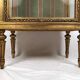 Louis XVI style showcase in wood and gilded stucco, circa 1900