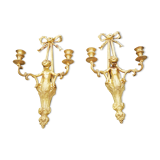 Paire d'applique à décors d'angelots
