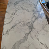 Marble effect table and chrome legs