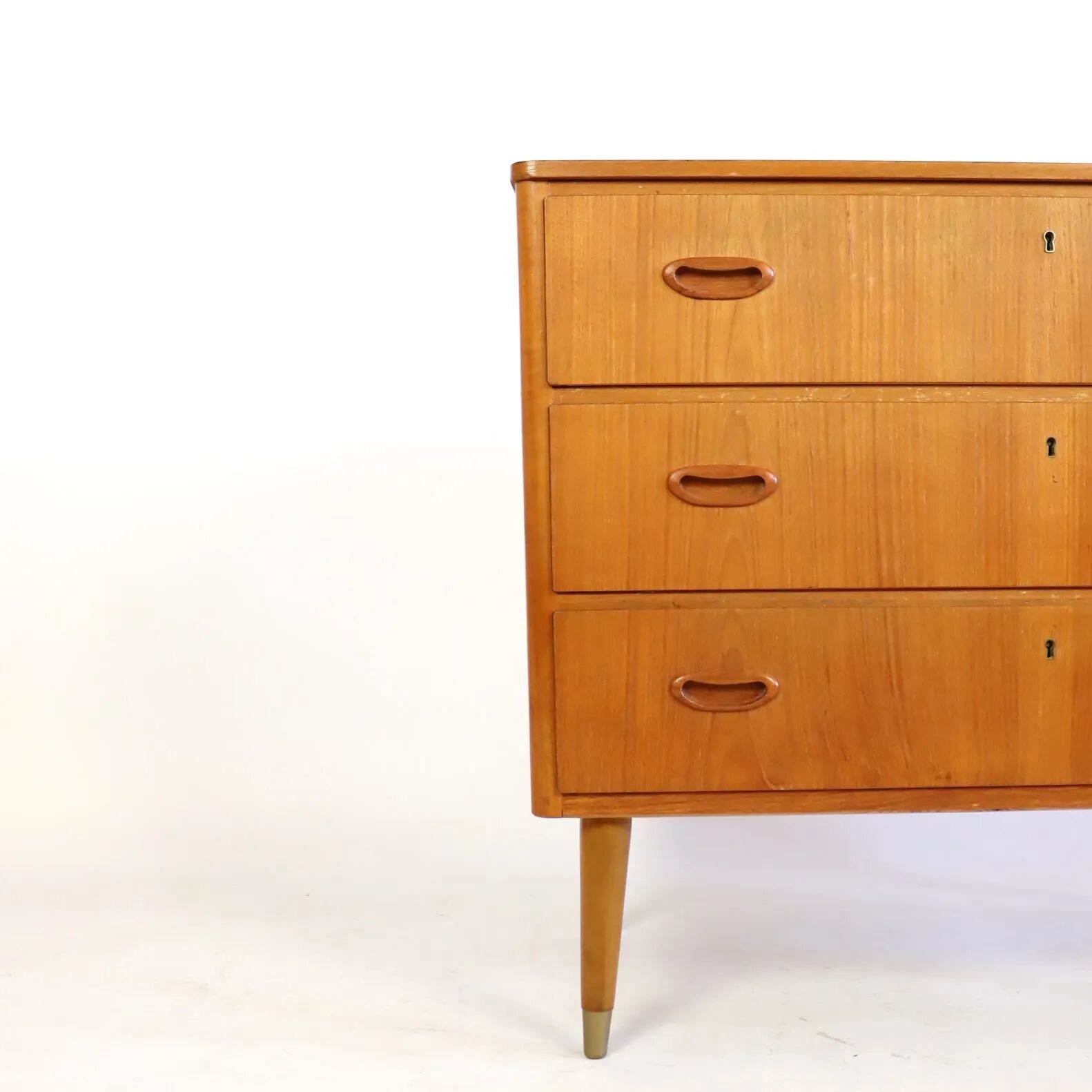 Commode en teck trois tiroirs