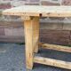 Primitive industrial table workbench in raw natural wood vintage bohemian trade store