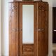 Antique Art Deco wardrobe in carved wood with mirror