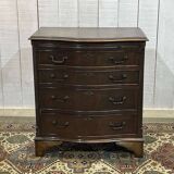 1950s English mahogany chest of drawers with one shelf