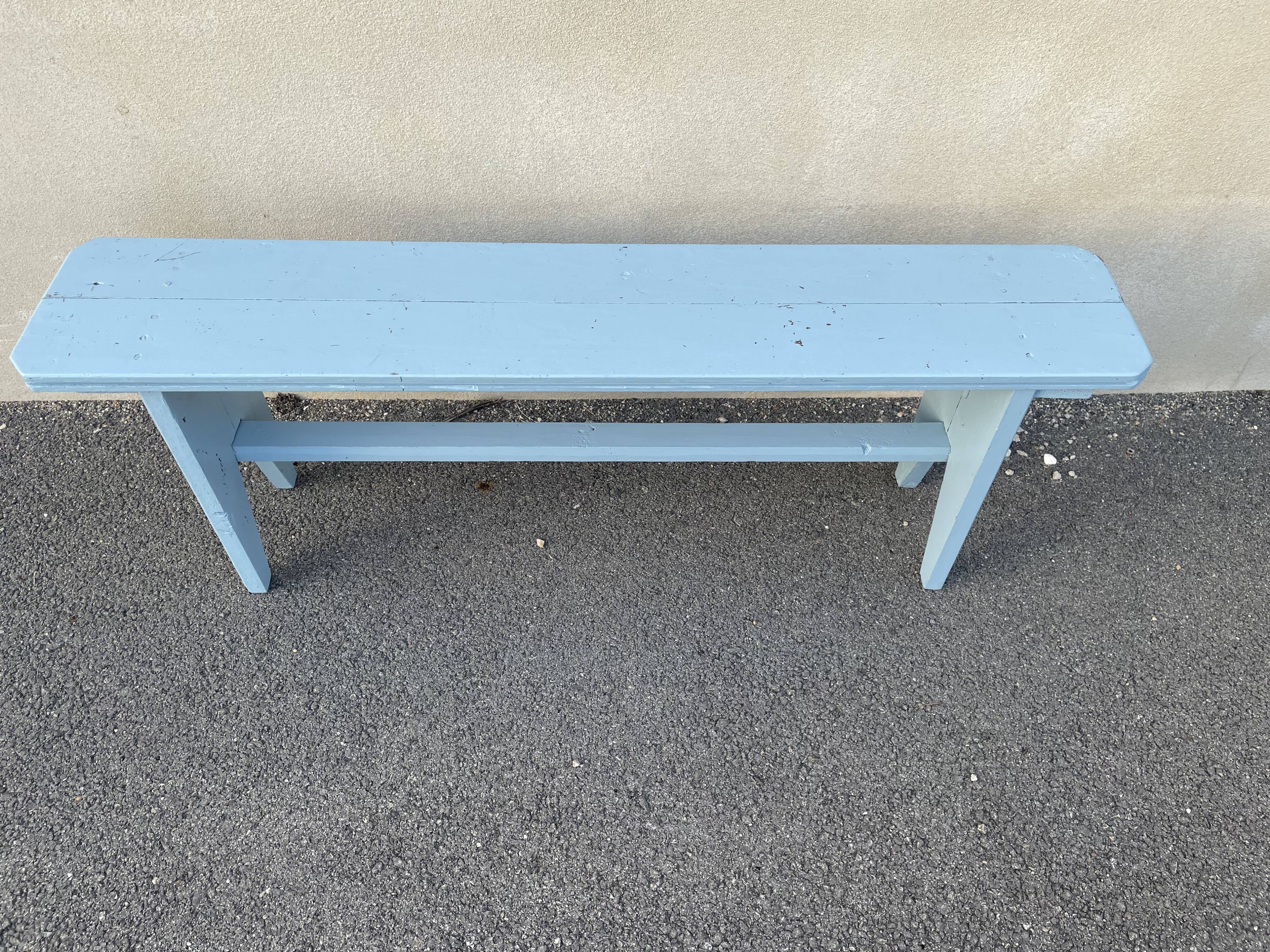 Blue painted wooden bench