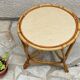 Round coffee table in vintage rattan