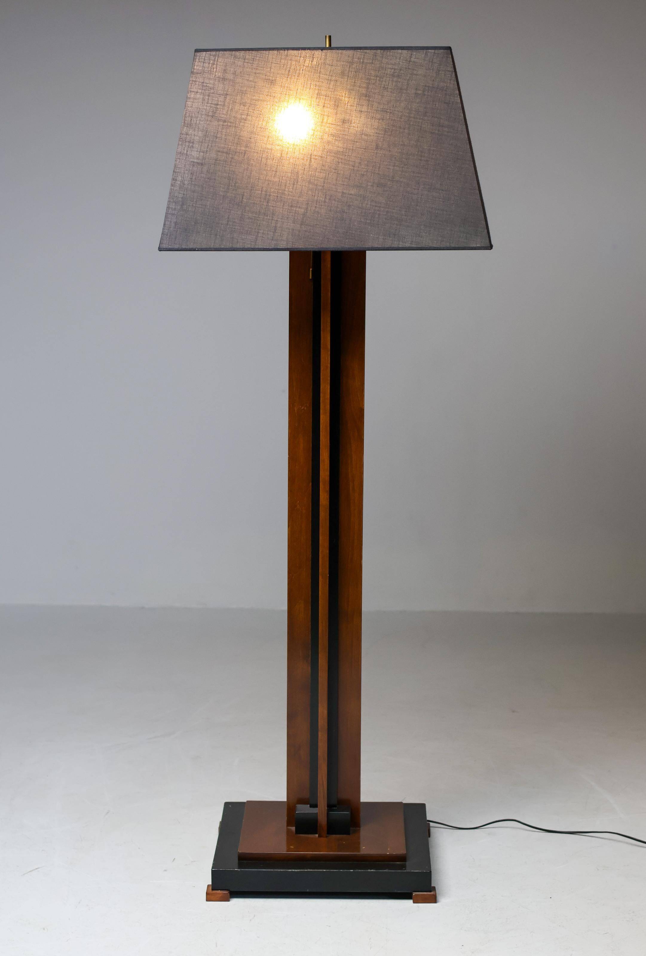 Amsterdam School floor lamp in partially ebonised cherry with a black linen shade.