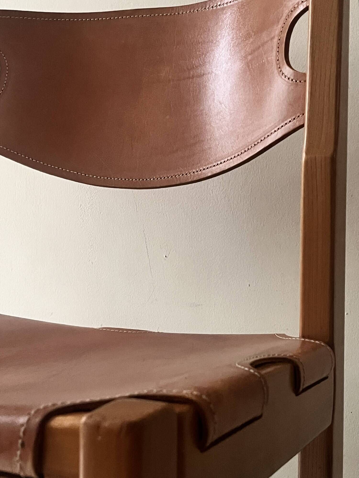 elm wood and camel leather chair Maison Regain, French design 1960