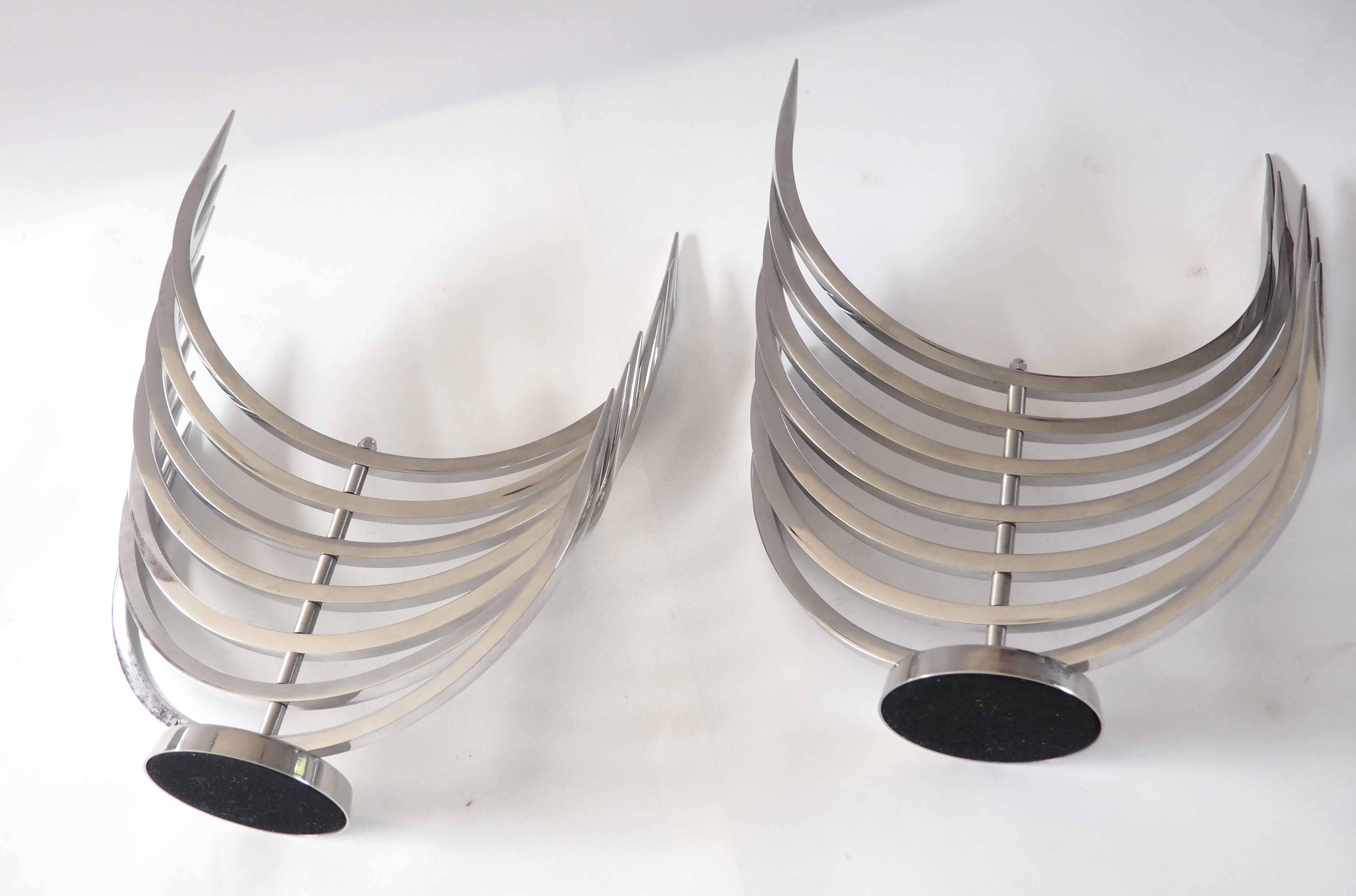 Pair of X Feal candlesticks