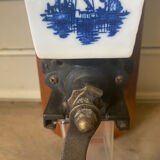 Old wall-mounted coffee grinder