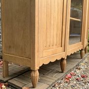 Asymmetrical Art Deco glass-fronted Parisian wardrobe in raw oak, 1930.