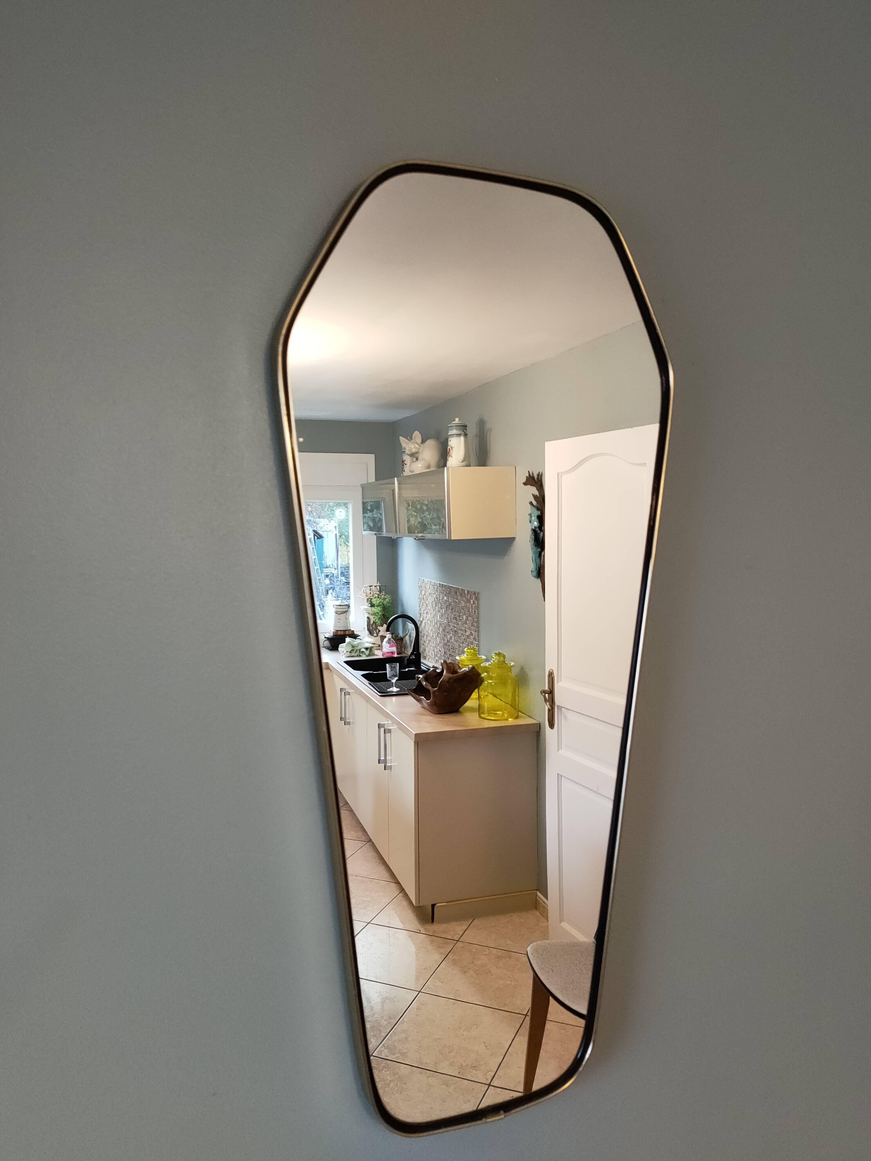 Free-form mirror from the 50s-60s