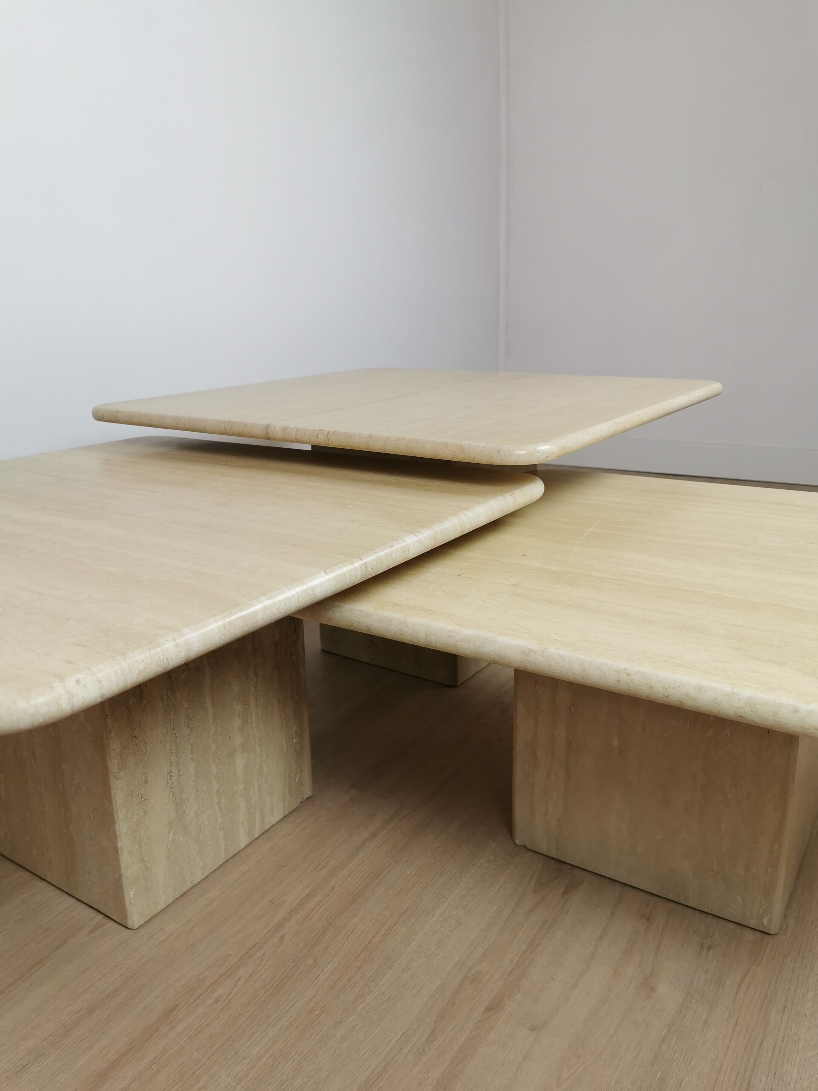 Side tables in travertine 70s