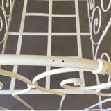White wrought iron folding bed
