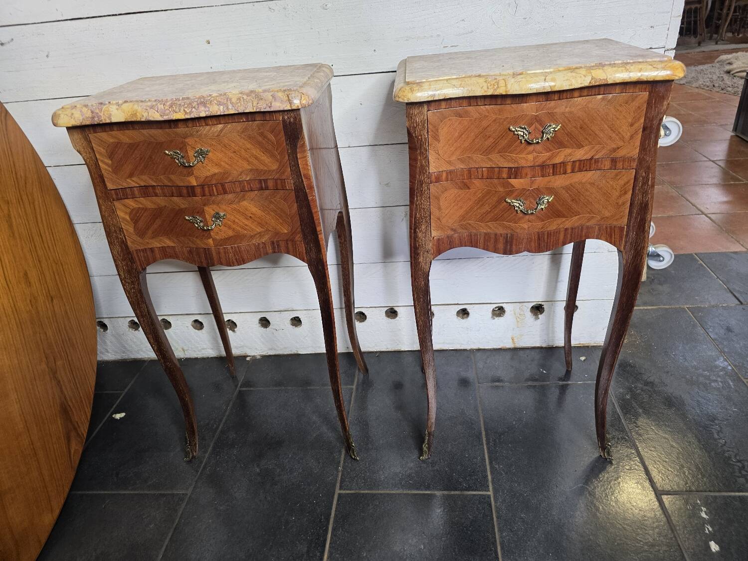 Pair of Louis XV style curved bedside tables in marquetry