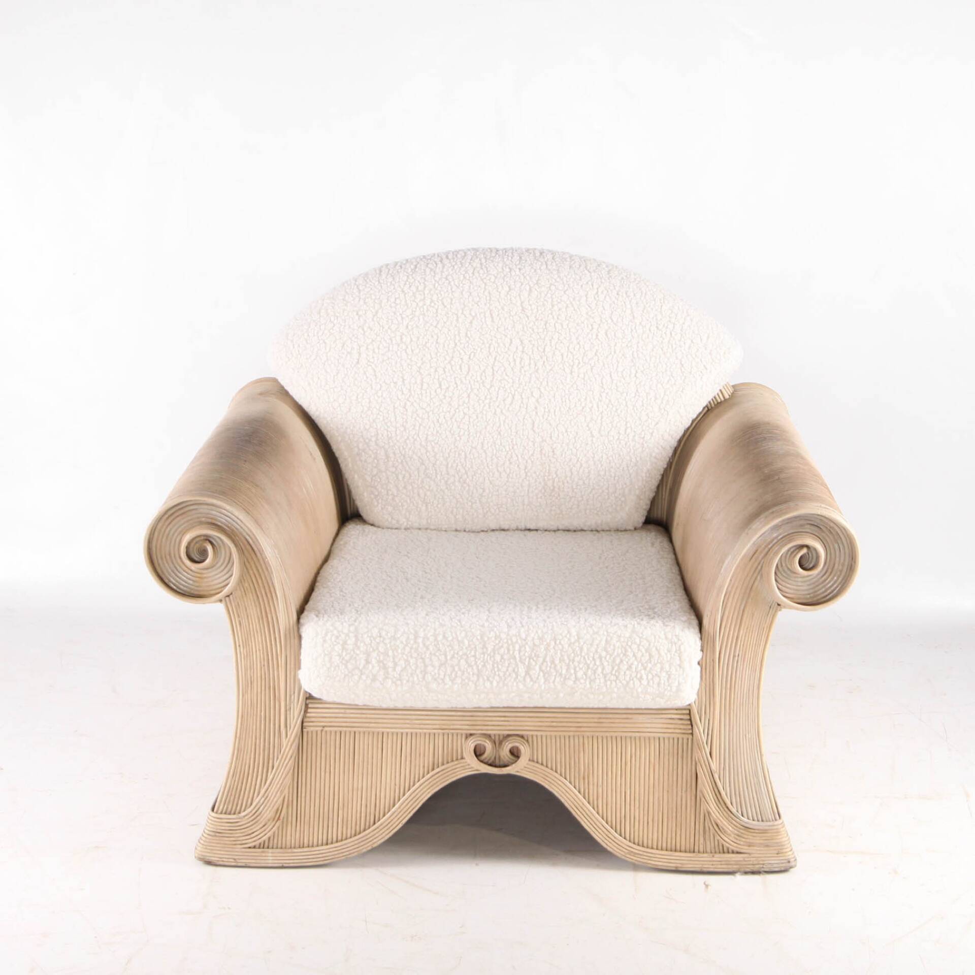 Rattan armchair by Betty Cobonpue