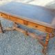 Old flat desk with brown leather top