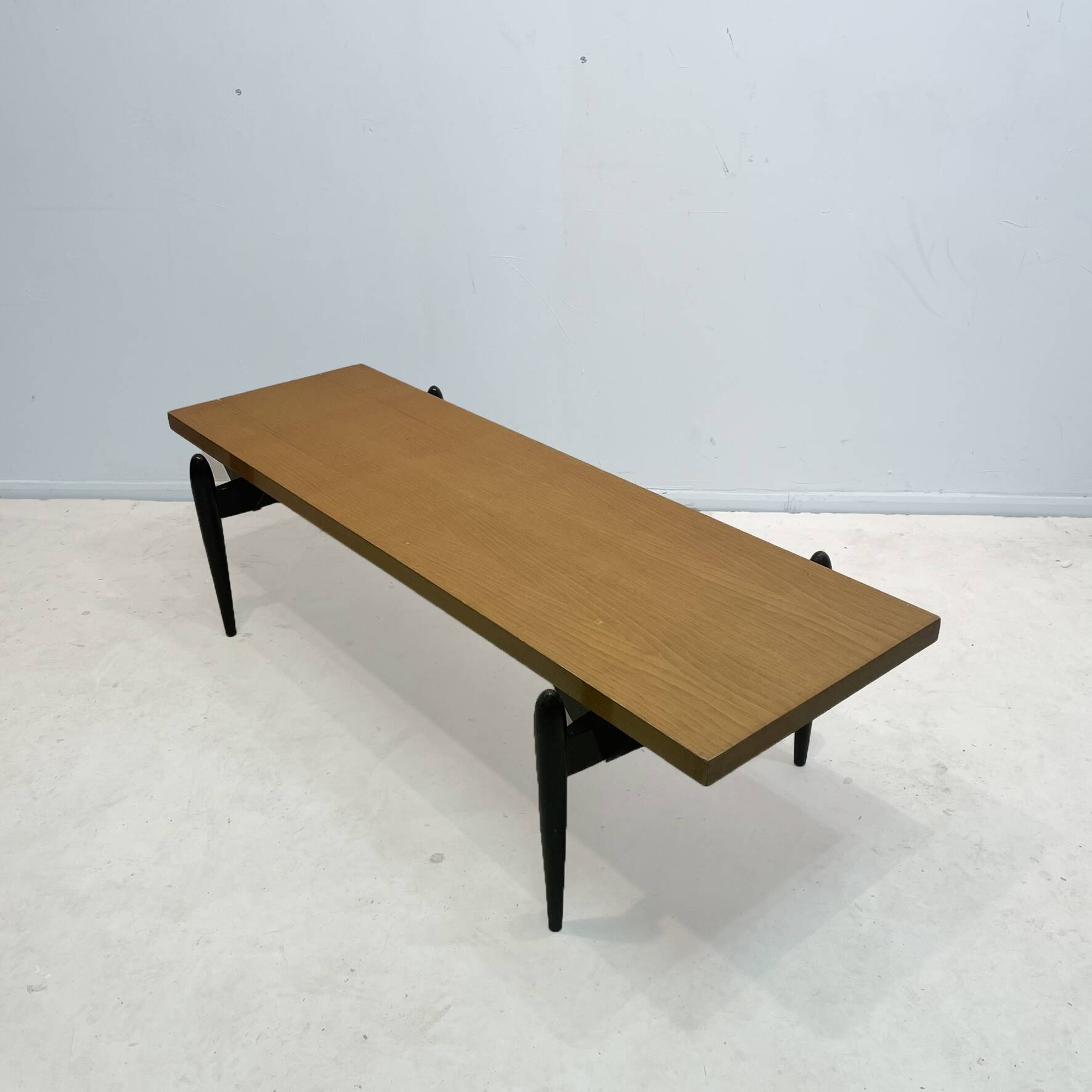Large 1950s modernist coffee table – sculptural black base