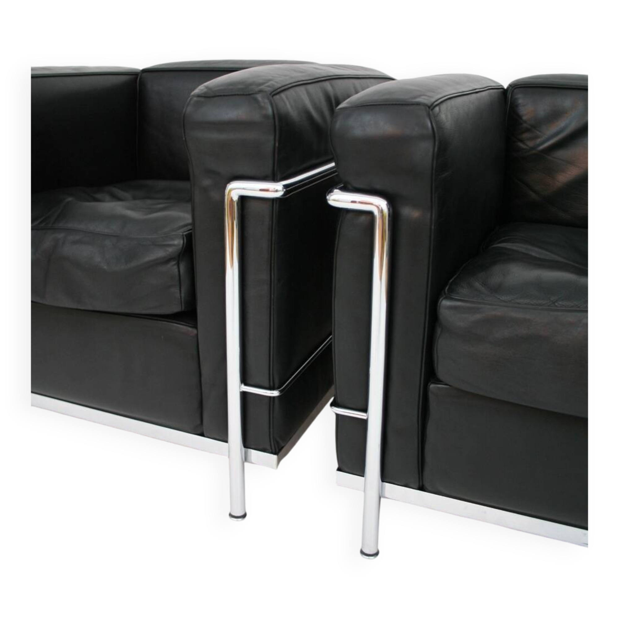 Pair of LC2 armchairs Perriand, Le Corbusier, Jeanneret, ed. Cassina