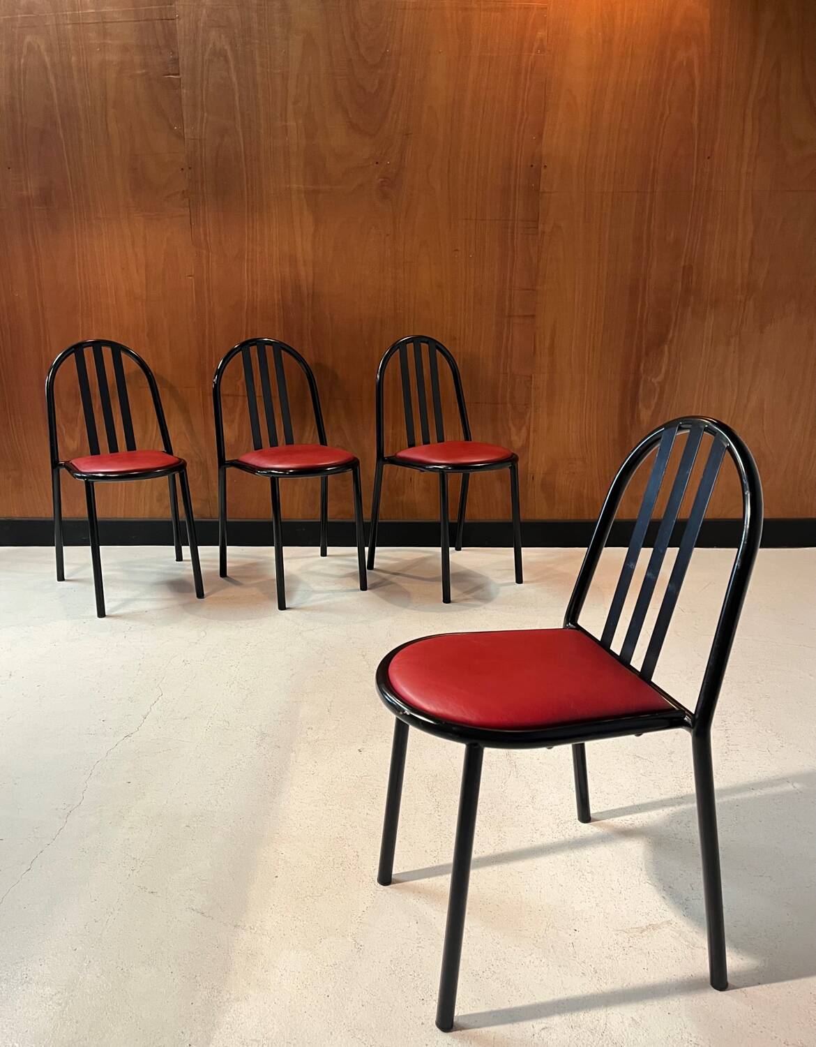 4 leather and steel chairs, designed by Robert Mallet-Stevens