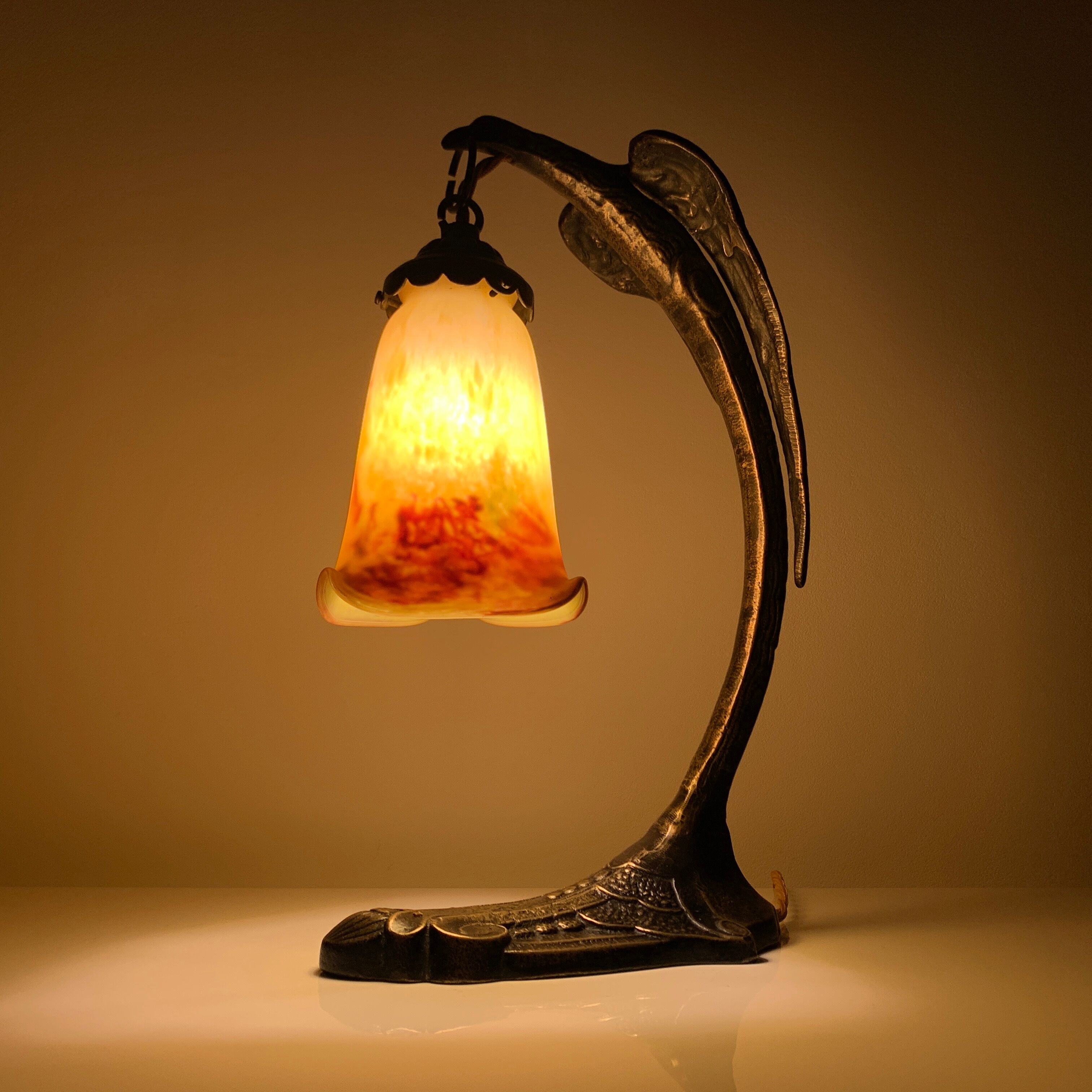 Bronze eagle lamp patinated and Art Nouveau style glass pate