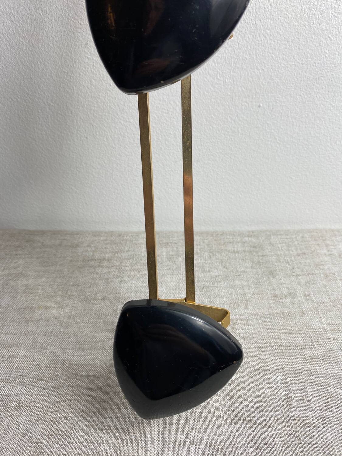 Wall-mounted coat rack with 3 hooks from the 1960s.