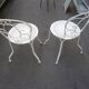 Pair of old wrought iron garden chairs