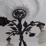 Chandelier with wrought iron and glass rose patterns