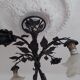 Chandelier with wrought iron and glass rose patterns
