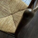 Set of 8 wooden chairs with rattan seats from the 1950s
